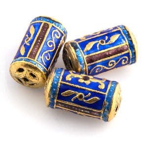 Blue enamel and gold plate cylinder bead with floral ornamental design. High quality bead.  China.  18x10mm.  Pkg.2. b2-665