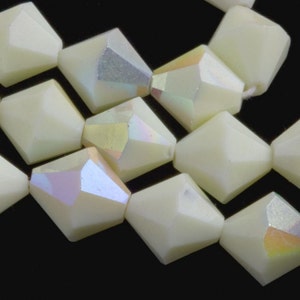 Vintage tin cut faceted opaque pale yellow glass bicones with partial AB finish, Czechoslovakia 1950-60s 10mm Pkg of 8.  b11-yo-0969-1