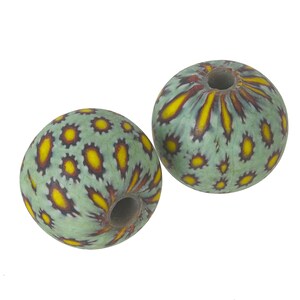 Ancient Indonesian Jatim bead replica. 20mm average size. pkg of 1. b1-908