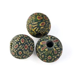 Ancient Indonesian Jatim bead replica. 16mm average size. Sold individually. b1-2013