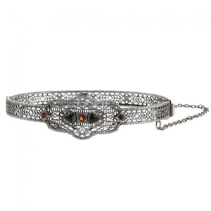 1930s art deco hinged rhodium plated filigree bangle bracelet with red and black glass stones, art deco jewelry. brad106