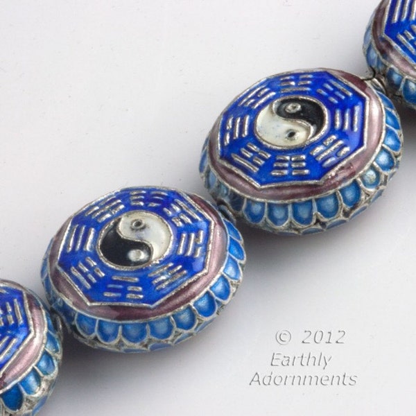 Chinese blue, red and white enamel over copper flattened hollow disk bead with Yin Yang symbol. 20mm. Sold individually. B18-0419