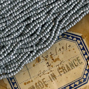 Antique French matte aluminum glass seed bead Size 10 . 48-49 gram hank. b17-105