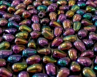 Tiny purple iris teardrops. 7x5mm. Pkg of 25. b11-pp-0800