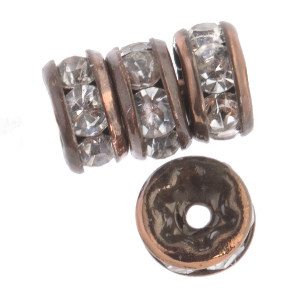 Clear rhinestone rondelle with antiqued copper. 6mm. Pkg of 4. b18-0270-2