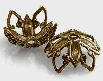 Stamped oxidized brass bead cap in a floral design. 9x4mm. Package of 12. b9-2376