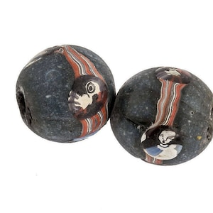 Ancient Indonesian Jatim bead replica. 19mm average size pkg of 1. b1-876