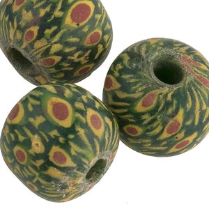 Ancient Indonesian Jatim bead replica. 16mm average size. Sold individually. b1-761