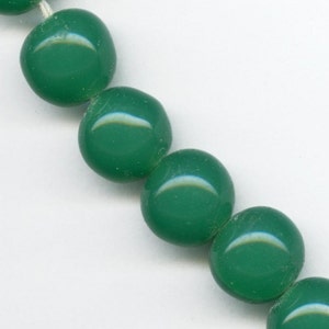 Vintage Japanese Cherry Brand chrysoprase green glass rounds. 11-12mm. Pkg of 4. b11-gr-0996