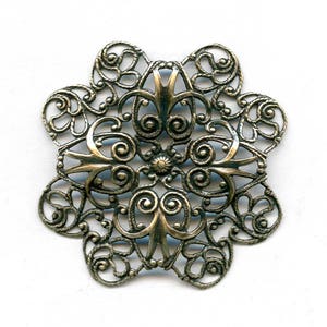 Oxidized brass stamped filigree pendant or wrap. 38mm. Sold individually. B9-2272