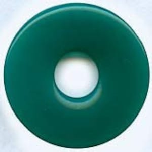 May include: A teal green donut-shaped ceramic ring holder.
