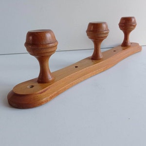 French vintage beechwood 3 peg coat rack with large domed pegs.