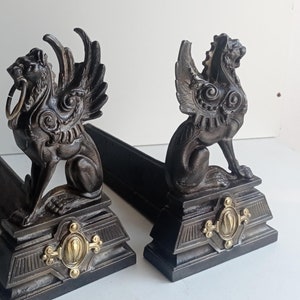 French Art Nouveau cast iron griffin fire irons / andirons circa 1910s.