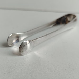 Art Deco, Christofle, French vintage, silver plated sugar tongs with geometric styling.