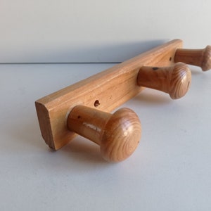 French vintage 3 peg pinewood coat rack.  Circa 1970s