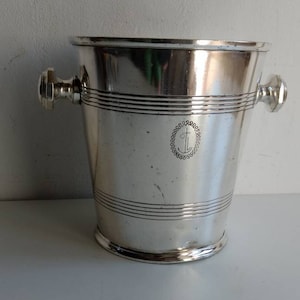 Champagne bucket, silver plated, Mappin & Webb dating the Art Deco period of decadence for Orient Line Steam Navigation Company circa 1920s.