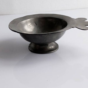 Antique French pewter scoop with wall hanging ring and pewter stamp.