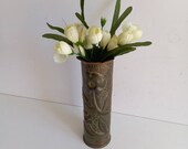 Trench Art, single decorative vases with engraved flower design, shells fired during First World War 1914 to 1918.