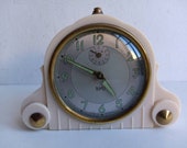 French vintage antique Art Deco SMI alarm clock, in amazing condition, with Bakelite case and brass adornments, circa 1920 30s.