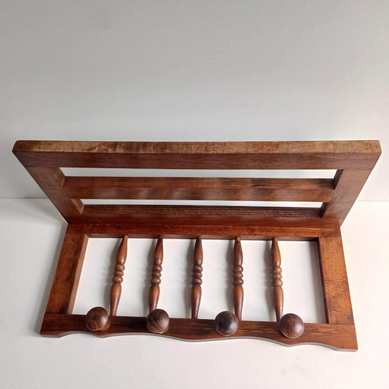 Mid Century wood French vestibule / bistro, railway carriage coat rack with 4 coat hooks, and rail hat rack circa 1950s. image 2