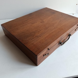 French vintage wood  box with carry handle and fabric interior.