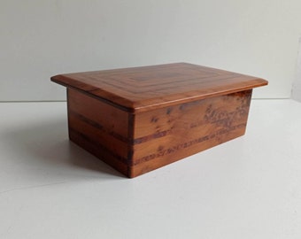 French vintage oblong  box with burl wood marquetry, hinged lid which is slightly rounded.
