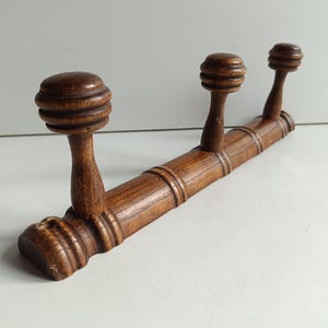 French vintage Modernist style vintage wood bamboo style, 3 peg coat rack circa Mid Century.