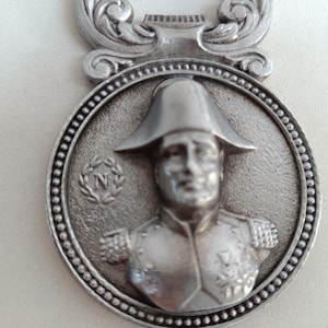 French vintage bottle opener Napoleon Bonaparte, with Paris on the reverse and its historic sites.
