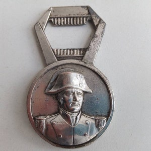 French vintage bottle opener Napoleon Bonaparte, with Paris on the reverse and its famous sites.