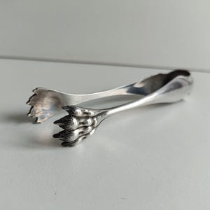 French antique, Ercuis Art Nouveau silver plated claw tongs for ice, or sugar lumps, circa 1910.