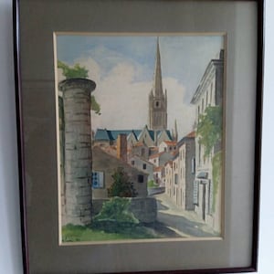 French vintage watercolour landscape painting of town with church and houses around, framed and behind glass signed 1947.