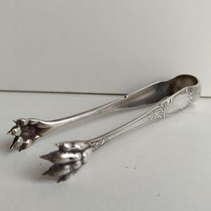 French Art Nouveau with Empire styling silver plated claw tongs for serving sugar / olives tongs with makers stamp.