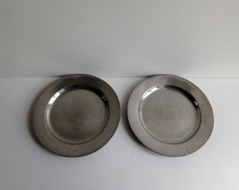 Pair of French antique / vintage pewter plates with modernist styling and interesting pewter marks, and family initials IR .