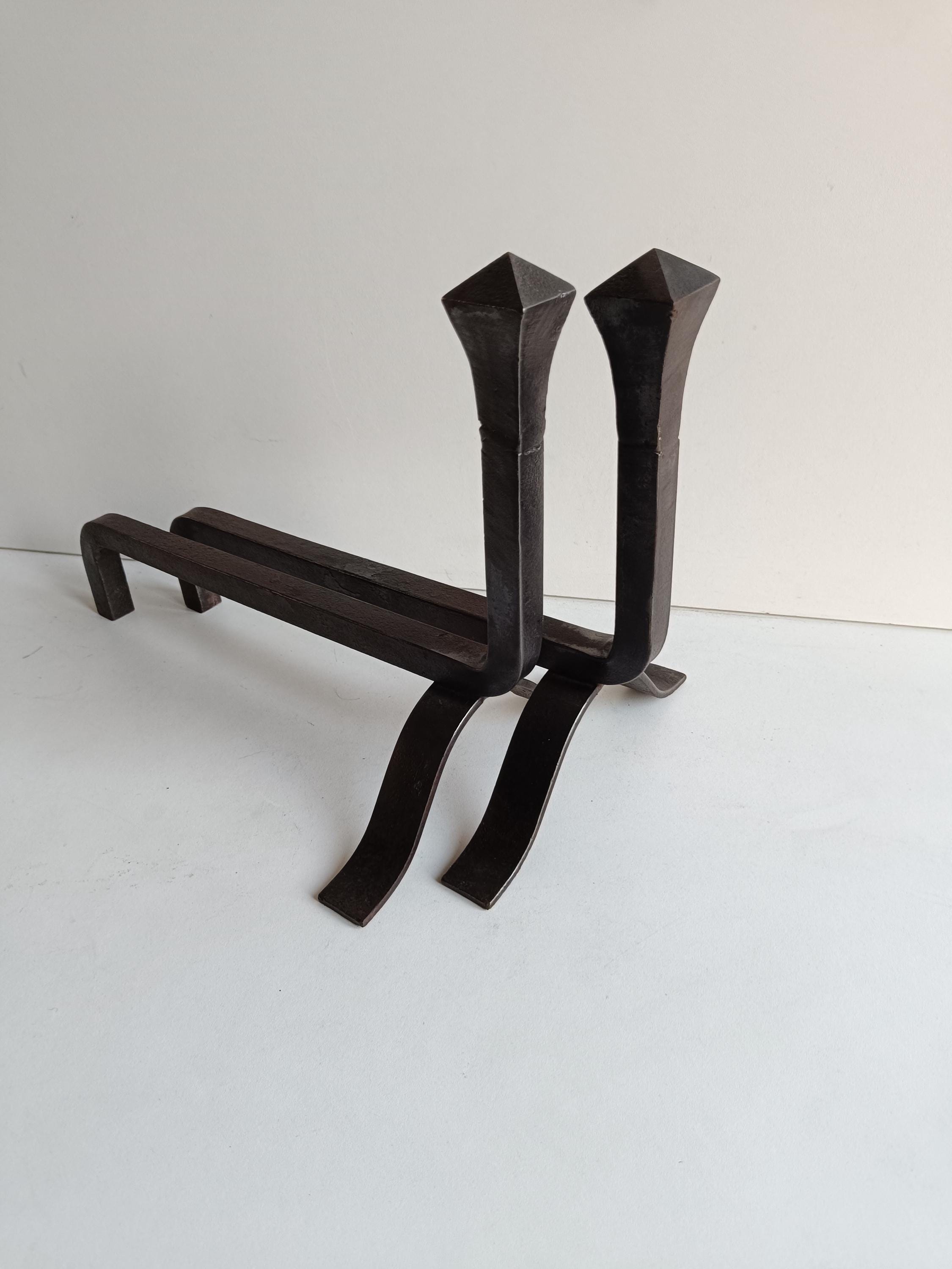 French antique Modernist wrought iron andirons circa early 1900s.