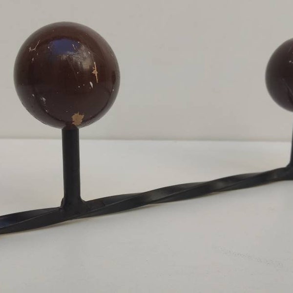 French vintage atomic 5 ball coat rack, on twisted wrought iron frame circa 1950s.