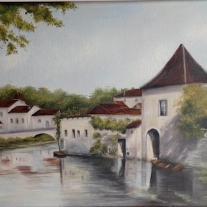 French vintage landscape oil painting of French riverside scene with buildings, signed and framed, circa 1950s.