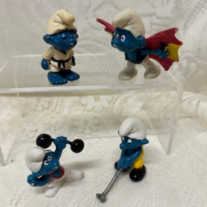 Vintage Peyo Schleich Smurfs PVC 4 Figures 1970&#39;s-1980&#39;s Sporty Smurfs Judo, Hang Glider, Golf, Weights