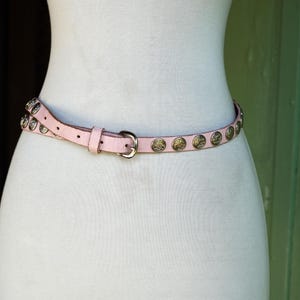 1990s Pink Thin Leather Belt with Silver Coin Looking Detail