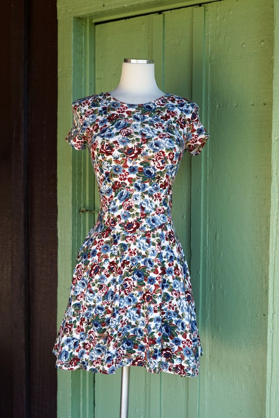 Floral jumper hot sale dress