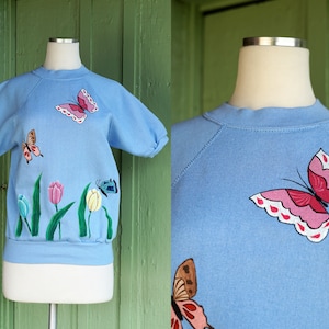 1980s Light Blue Short Sleeve Sweatshirt with Hand Painted Butterfly Tulip Floral Design // 80s Panill Short Sleeve Sweatshirt