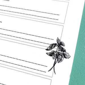 May include: A blank white page with dotted lines and a black and white illustration of a sprig of basil in the bottom right corner.