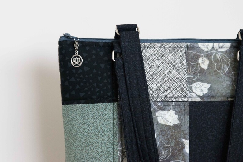 double handles pieced quilted padded zip top inside slip and zip pockets Stylin/' Squares Tote: large roomy interior 2 outside pockets
