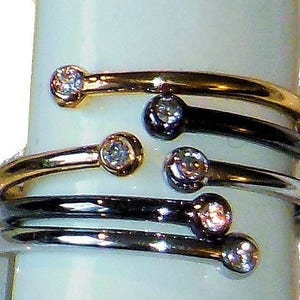 Dot Stacking Rings, with or without diamonds, in 18K gold, 14K gold, Sterling Silver, Platinum. Interchangeable, mix-and-match fun