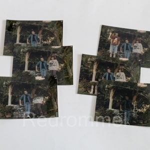 May include: Six vintage photographs of people posing in front of a wooden structure with a vine-covered roof. The photos are printed on a white background.
