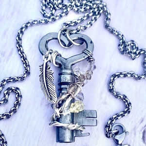 Antique heart skeleton key pendant