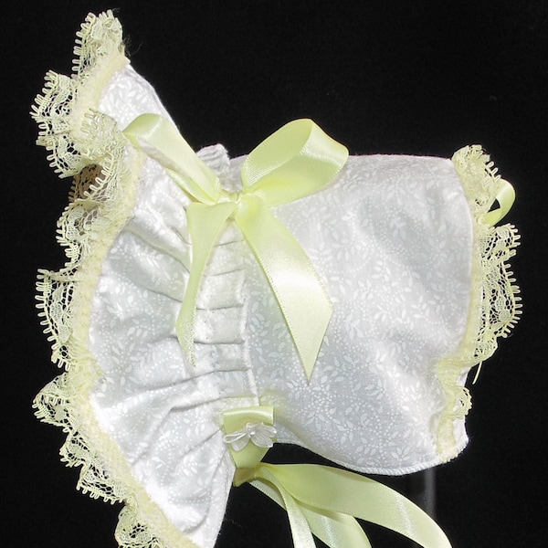 White Printed Cotton with Yellow Lace , Bows, and Ties Baby Bonnet