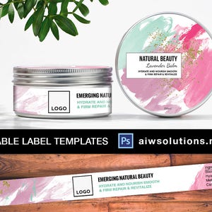 May include: Two silver metal containers with labels. One label reads "NATURAL BEAUTY Lavender Balm" with pink and teal brushstrokes. The other label says "EMERGING NATURAL BEAUTY". The image also includes the text "EDITABLE LABEL TEMPLATES" and "aiwsolutions.net".