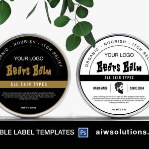 May include: Two black and white labels for a beard balm product. The labels are round and have a black background with white text. The text on the labels reads "Organic Nourish Itch Relief", "Your Logo", "Beard Balm", "All Skin Types", "Hand Made", and "Since 2004". The labels are on a white background.