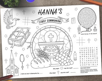 May include: A black and white printable coloring page for a first communion celebration. The page features a chalice, bread, grapes, a dove, a church, a rosary, a bible, and a word search puzzle. The text "HANNA'S FIRST COMMUNION" is at the top of the page.
