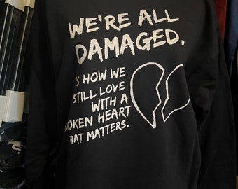 We’re All Damaged- Crewneck Sweatshirt